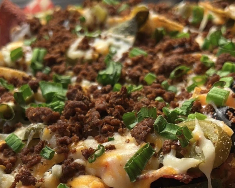 Grand Slam Nachos with shredded cheddar, olives, jalapenos, salsa and sour cream at Pregame Sports Bar & Lounge, Winnipeg
