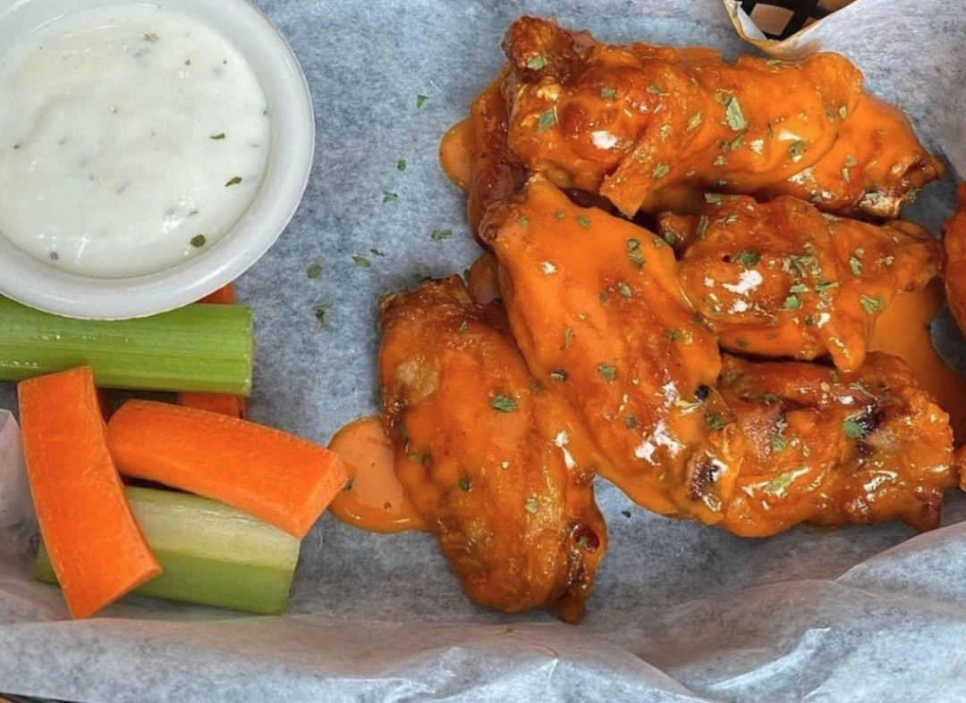 Pregame Wings tossed in your choice of sauce at Pregame Sports Bar & Lounge, St. Boniface, Winnipeg