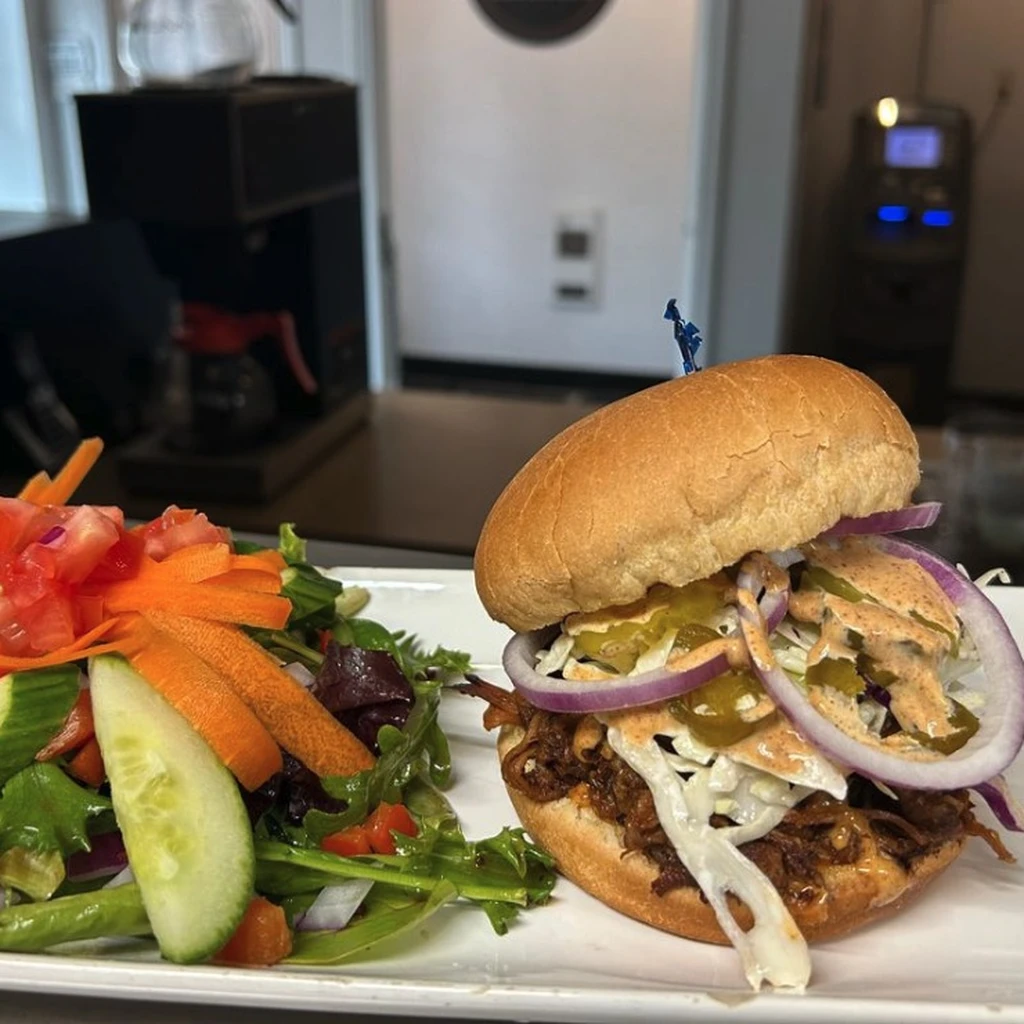 The Smokestack pulled pork sandwich with smokey BBQ, cheddar and coleslaw at Pregame Sports Bar & Lounge, Winnipeg